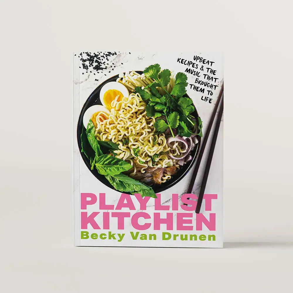 Book cover of Playlist Kitchen. There is a close up overhead photo of a ramen bowl on the cover. 